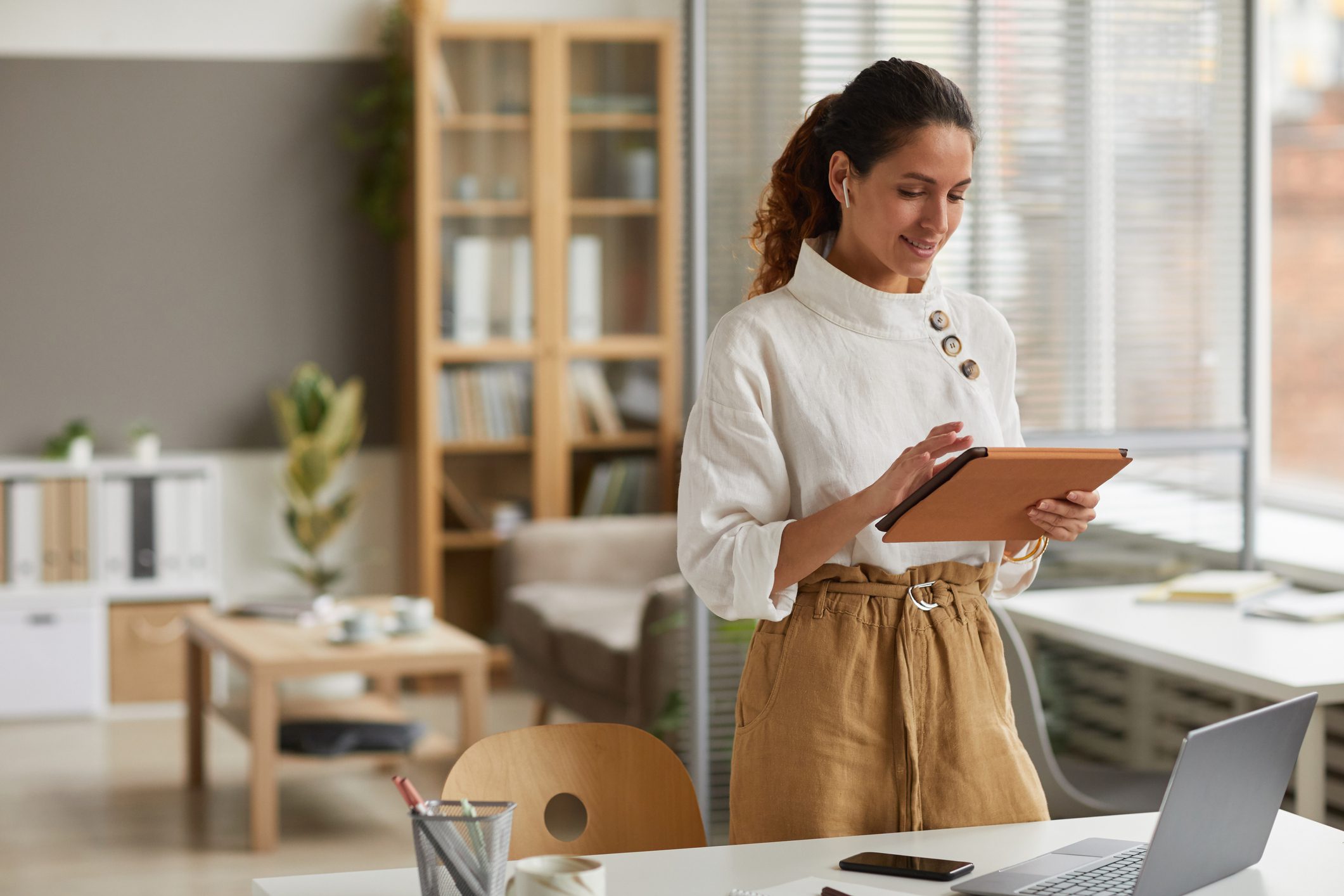 Modern Businesswoman Using Tablet