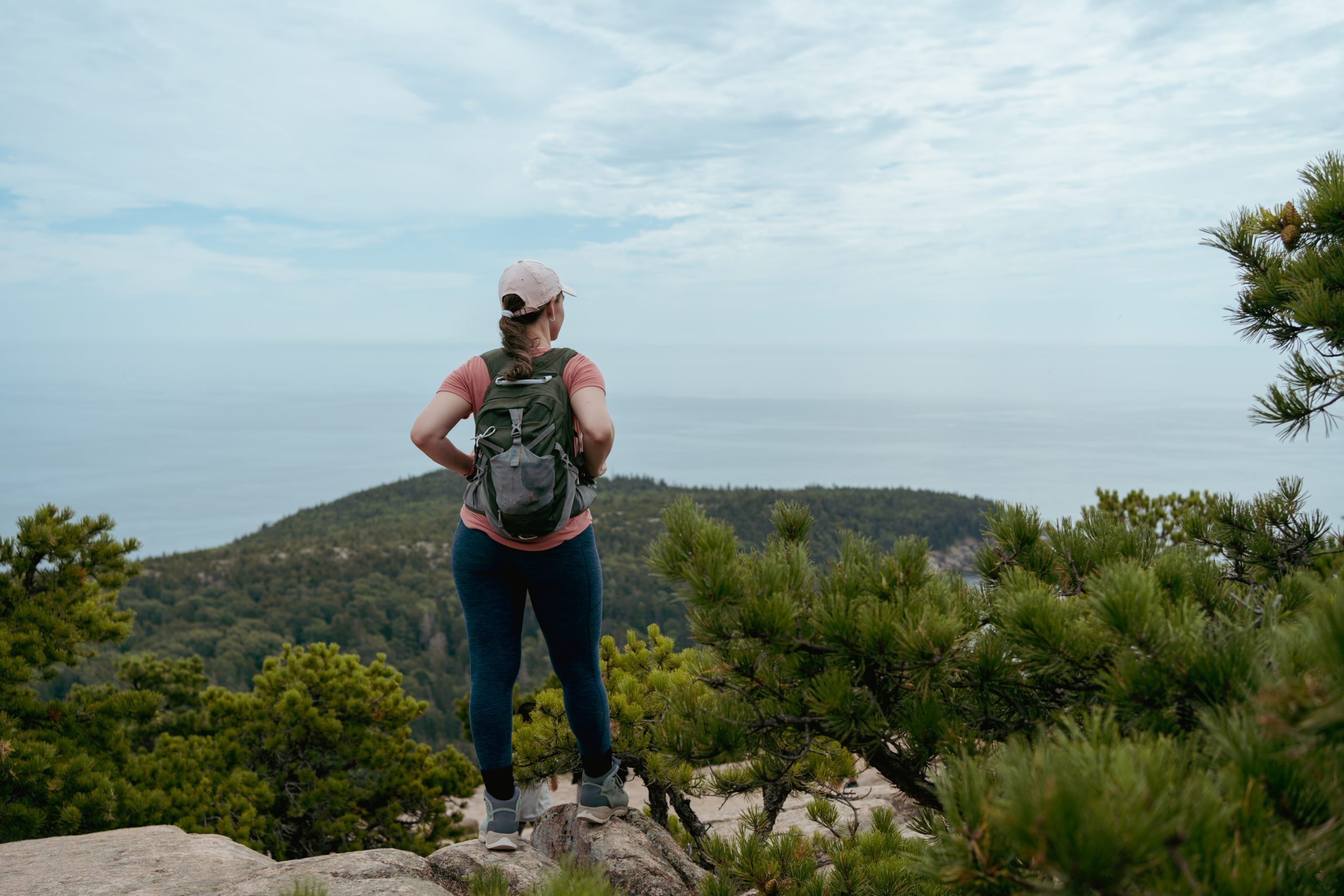 Lonely woman hiking in Acadia National Park